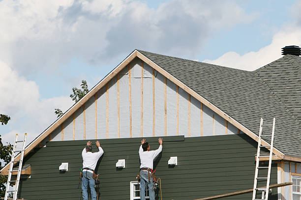 Professional Storm Damage Siding Repair technician working in Waynesburg, PA